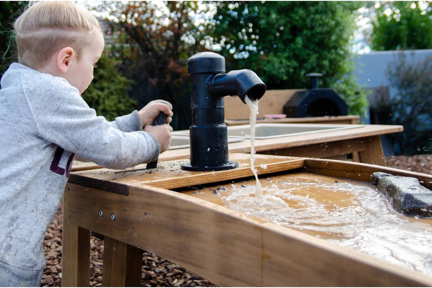 sand and water play set with hand pump